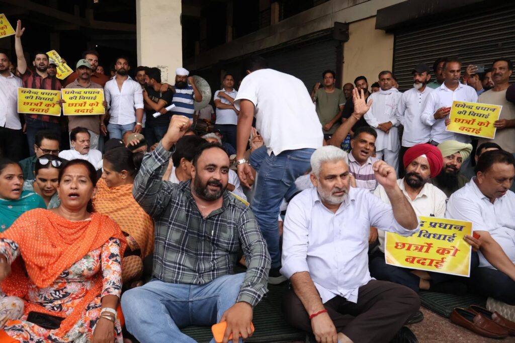 Dharmendra Pradhan resigns; AAP hails it as a victory for students and the youth.