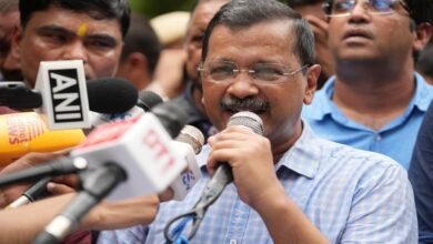 Kejriwal sits on protest against E-20 petrol; police stop march.