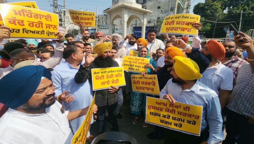 AAP stages strong protest in Punjab against UPI transaction charges.