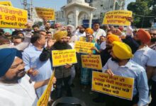 AAP stages strong protest in Punjab against UPI transaction charges.